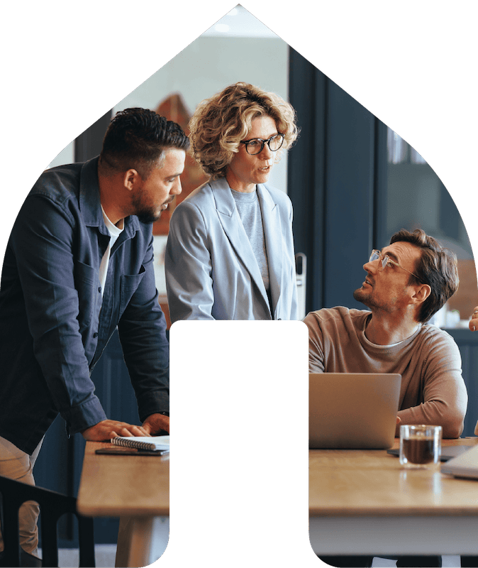 Two Mortgage Brokers Speaking with a Real Estate Agent