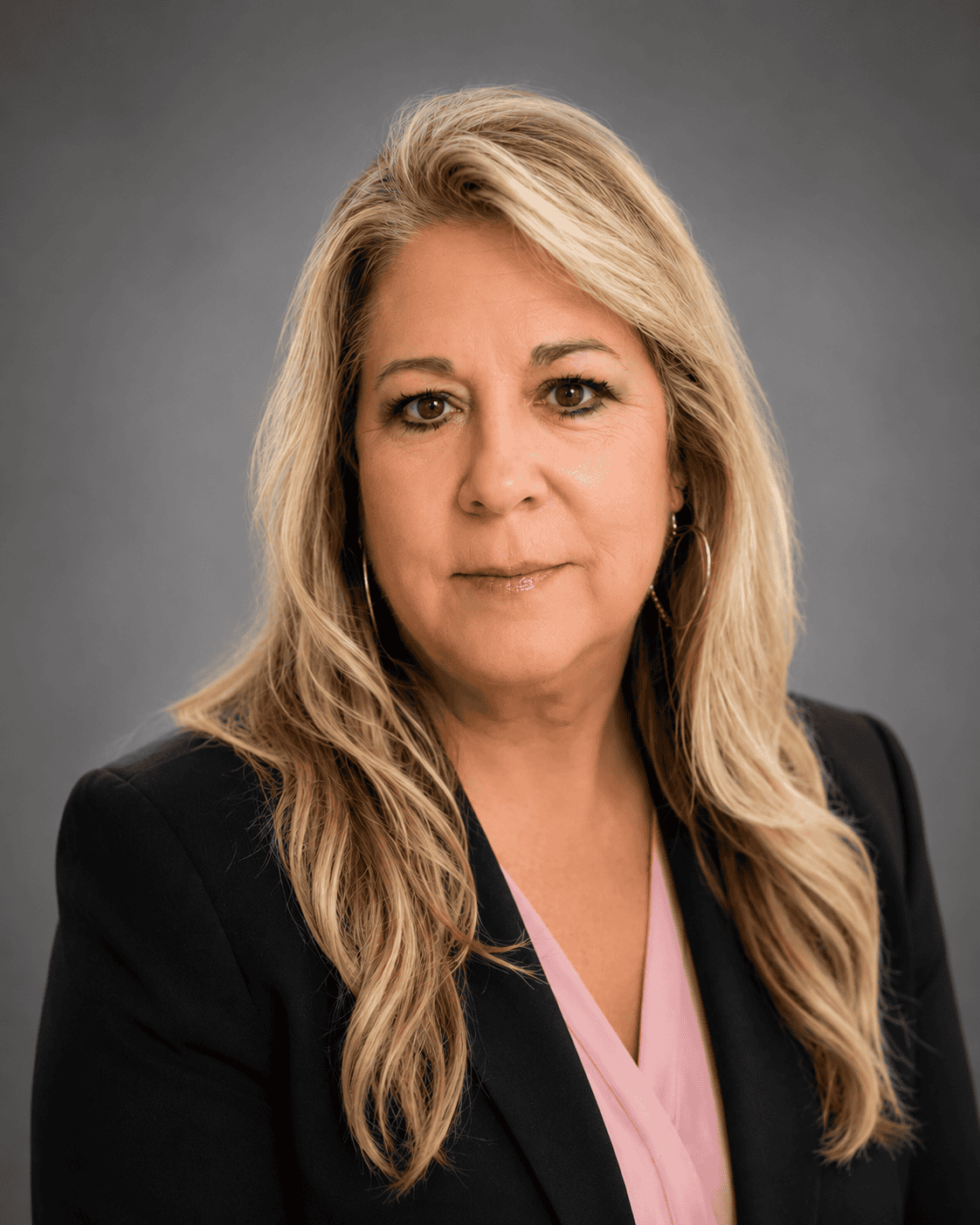 Professional portrait of Kim Bonaventure, a representative of GMFS Partners, with a confident expression and business attire.
